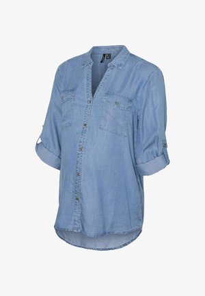 Ανοιχτό μπλε τζιν πουκάμισο με κούμπωμα μπροστά, μανίκια που κουμπώνουν, δύο τσέπες στο στήθος και καμπυλωτή στρίφωση. Μαλακή υφή, casual σχέδιο.