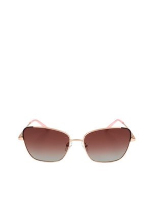 Occhiali da sole con sottili montature in metallo dorato, lenti marroni sfumate e aste con punte rosa, mostrati frontalmente su sfondo bianco.