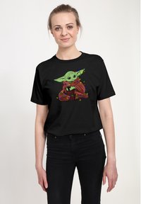 Star Wars STAR WARS: THE MANDALORIAN GROGU LIGHTS - T-shirt med print - black
