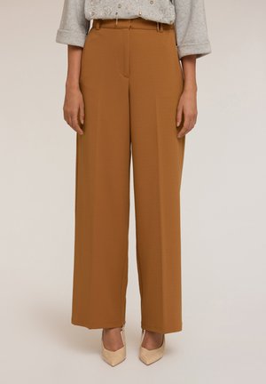 CON IMPUNTURE - Pantaloni - marrone