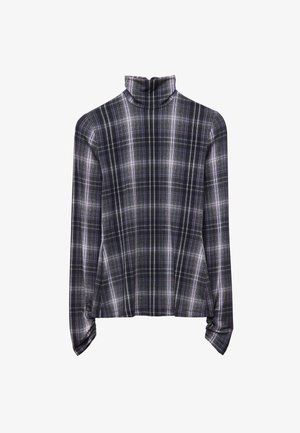 Langärmliges Turtleneck-Oberteil aus weichem Stoff mit einem schwarz-weißen Karomuster und dezenten lila Akzenten. Figurbetonter Schnitt, abgerundeter Saum.