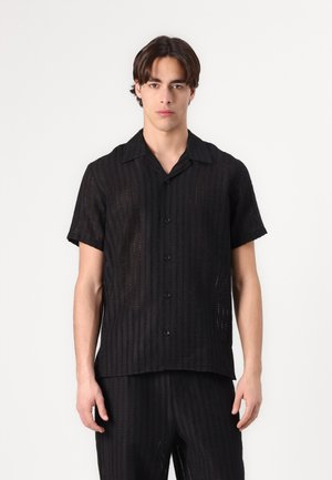 CAVE - Shirt - black