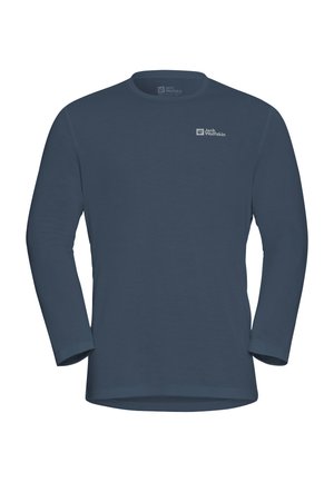 Camicia a maniche lunghe di colore blu scuro, realizzata in un tessuto liscio. Presenta un colletto girocollo e un piccolo logo sul petto.
