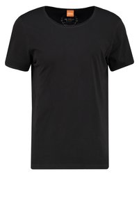 Svart kortärmad t-shirt i mjuk bomullstyg. Har rund halsringning och rak passform, utan synliga tryck eller dekorationer.