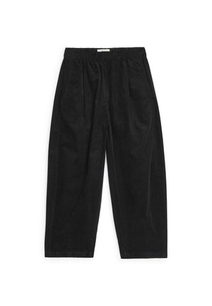 Pantalon en velours côtelé noir avec une taille élastique, des jambes droites et des poches latérales, présenté sur fond blanc.