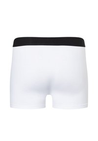 Boxer in cotone bianco con vita elastica nera, texture liscia e design aderente. Nessun motivo o decorazione aggiuntiva.