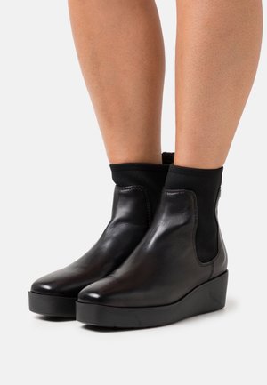 Unisa, Bottines compensées - black