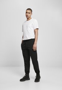 Urban Classics Treniņtērpa apakšdaļas - black