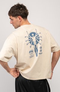 Cream cotton t-shirt with short sleeves, featuring a blue graphic of a human figure with multiple arms on the back, text below the design.