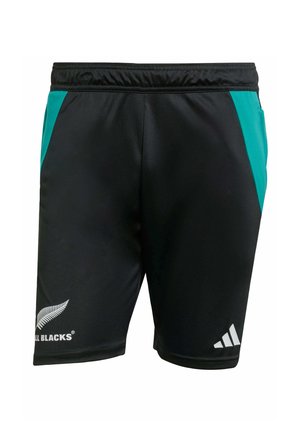 Pantalones cortos deportivos negros con acentos laterales en color azul verdoso, cinturilla elástica y logotipos en blanco de All Blacks y Adidas en la parte baja de las piernas. Tejido suave.
