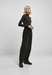 Urban Classics LADIES HIGH WAIST 90´S WIDE LEG CORDUROY PANTS - Kalhoty - black