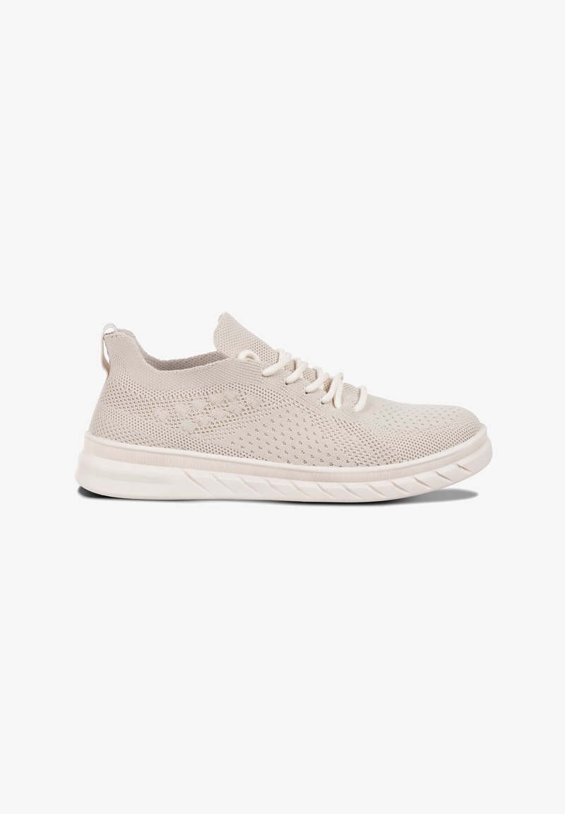 Light beige knit athletic shoes with a breathable mesh upper, textured pattern, rounded toe, and a textured sole featuring a curved design.