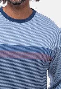 Long-sleeve shirt with blue and white horizontal stripes, featuring a solid navy crew neckline and a wider red stripe accent.