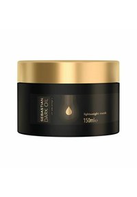 Sebastian Dark Oil lightweight mask in a black jar with a gold lid, features a droplet graphic and text, 150 ml capacity.