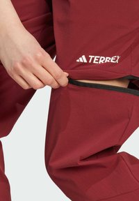 Adidas Terrex UTILITAS - Outdoor trousers - shadow red