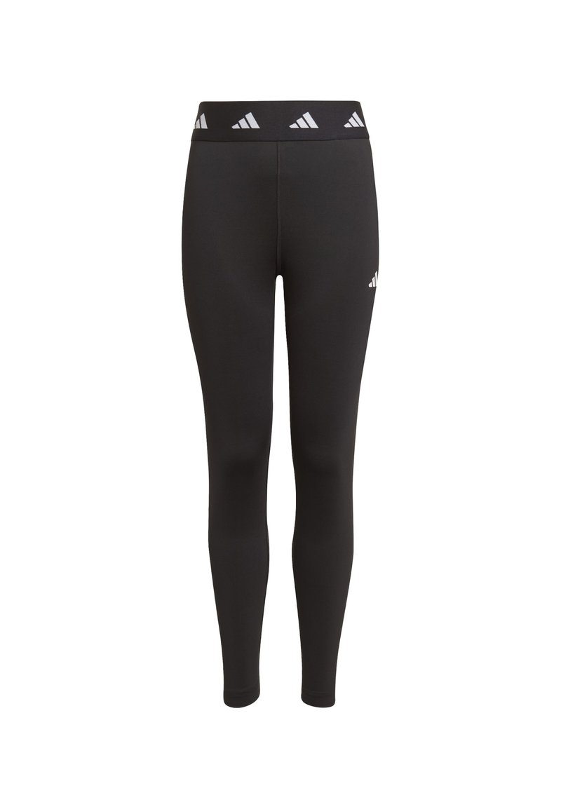 Leggings negros de tela elástica, con una cinturilla ancha que presenta un patrón de logotipos blancos repetidos y un pequeño logotipo en la cadera izquierda.