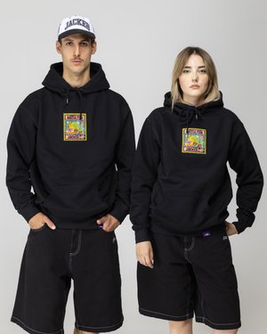 Black hooded sweatshirts with colorful graphic patches, paired with knee-length black shorts featuring white stitching accents.