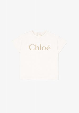 T-shirt pour tout-petit à manches courtes blanc avec un logo "Chloé" beige centré sur le devant et une fermeture par bouton au niveau de la nuque à l'arrière.