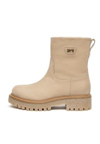 Stivale alla caviglia beige realizzato in pelle testurizzata. Presenta una suola spessa e scanalata e un piccolo logo decorativo sul lato. Anello di trazione sul retro.
