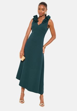 Teal, sleeveless dress with a v-neckline featuring floral appliqués at the shoulders. A-line silhouette with a knee-length hem and smooth fabric texture.