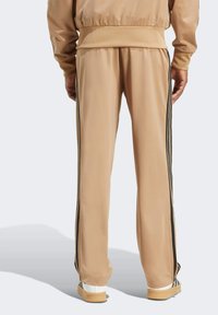 adidas Originals FIREBIRD  - Tracksuit bottoms - cardboard