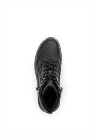 Bottines noires en cuir lisse, avec un design à laçage, des zips latéraux et une doublure en polaire pour plus de chaleur. Semelle texturée pour une meilleure adhérence.