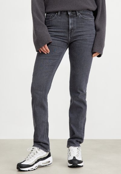 Smal passform jeans i mørkegrå denim, med klassisk fem-lomme-design, subtil søm og medium midje.
