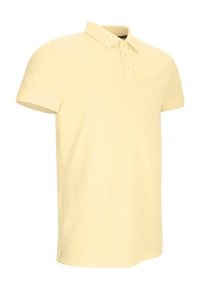 Polo-Shirt in hellgelb, aus Baumwolle. Verfügt über einen klassischen Kragen, eine Dreiknopf-Leiste, kurze Ärmel und seitliche Schlitze am Saum.