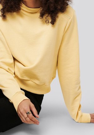 Kapuzenpullover - yellow
