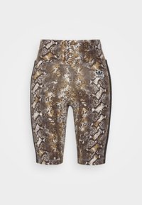 Bruna sportshorts med ormskinnsmönster, hög midja, svarta detaljer på sidorna och Adidas-logo på vänster fram.