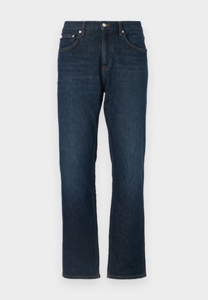 Tamsiai mėlyni džinsai su tiesiom kojomis, turintys penkis kišenes, mygtuko užsegimą ir kontrastingas oranžines siūles.