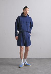 Helmut Lang EMBOSSED - Calções - indigo