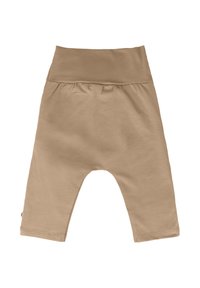 Pantalons de jogging en coton beige avec une large ceinture élastique, coupe ample et ouvertures de jambe arrondies. Texture lisse avec des détails de couture subtils.