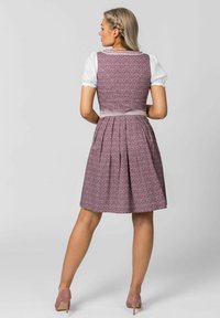 Laced cream blouse paired with a floral patterned, knee-length lavender dress, featuring pleats and a satin ribbon belt at the waist.