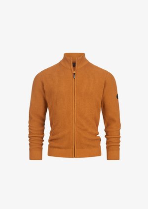 Orange knitted zip-up cardigan with a high neck, ribbed cuffs, and a black logo patch on the left sleeve. Soft, textured fabric.