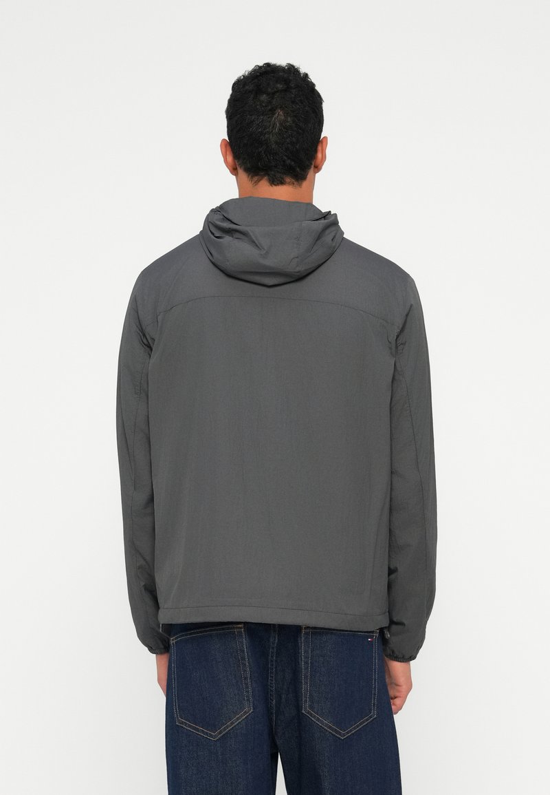 Tommy Jeans CHICAGO JACKET - Mezisezónní bunda - mottled black