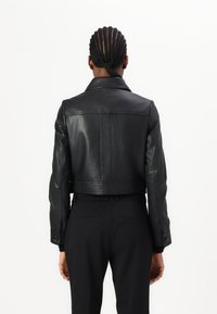 COACH SNAP FRONT SHRUNKEN JACKET - Lederjacke - black