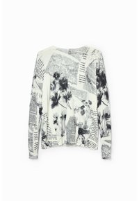 Camicia a maniche lunghe in morbido tessuto bianco con design floreale nero e stampa di giornale. Vestibilità ampia con scollatura rotonda e spalle scese.