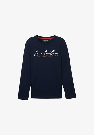 Pamučni majica dugih rukava u mornarskoj boji, s okruglim izrezom, natpisom u bijeloj i crvenoj boji, i opuštenim krojem.