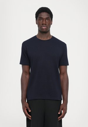 Kortærmet navy t-shirt lavet af bomuld, med rund halsudskæring og en afslappet pasform, uden mønstre eller synlige metaldele.