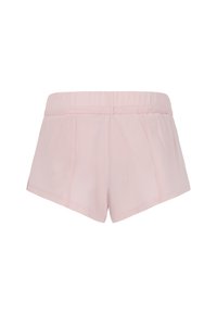 Vaaleanpunaiset, joustavavyötäröiset shortsit, joissa on löysä istuvuus, sivutaskut ja sileä kangaspinta. Suora helma ilman lisäkoristeita.