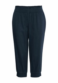 Pantalons courts bleu foncé en tissu doux, dotés d'une taille élastique et de poignets froncés pour un ajustement décontracté.