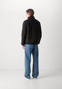 Tommy Jeans ESSENTIAL QUILTED JACKET  - Vinterjacka - black