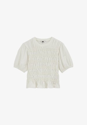 Biała bluzka z krótkim rękawem, marszczonym przednim panelem, okrągłym dekoltem, marszczonymi bufkami oraz falbaną u dołu.