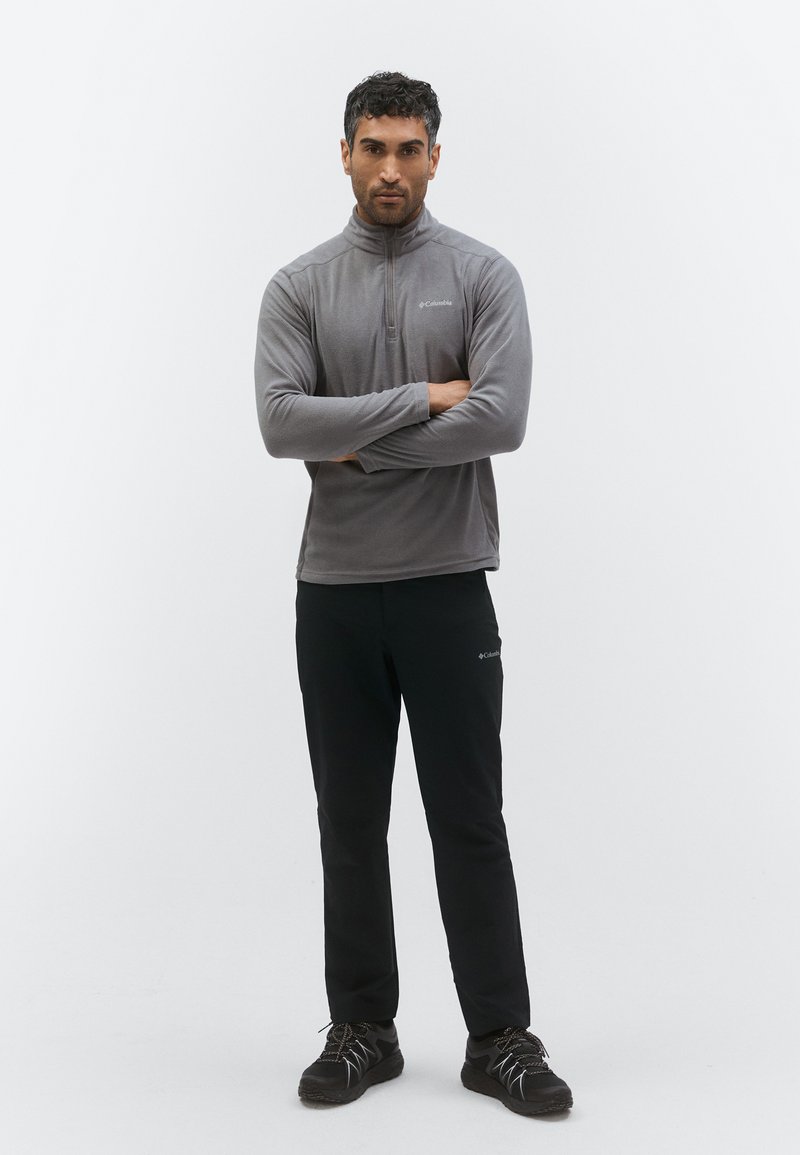 Haut première couche à manches longues Dri-FIT Jordan Sport pour homme. BE