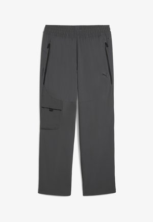 Sivé športové nohavice s elastickým pásom, zipsovými vreckami, cargo vreckom na boku a hladkým, ľahkým materiálom.
