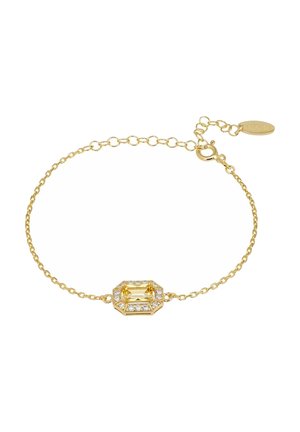 Delikatna złota bransoletka z łańcuszkiem z prostokątnym żółtym kamieniem szlachetnym otoczonym małymi przejrzystymi kryształami oraz regulowanym zapięciem.