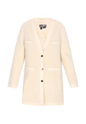 Krém színű, texturált anyagból készült kardigán, V-nyakkal, két elülső zsebbel, öt gombbal és hosszú ujjal, amelynek az alja passzézott.