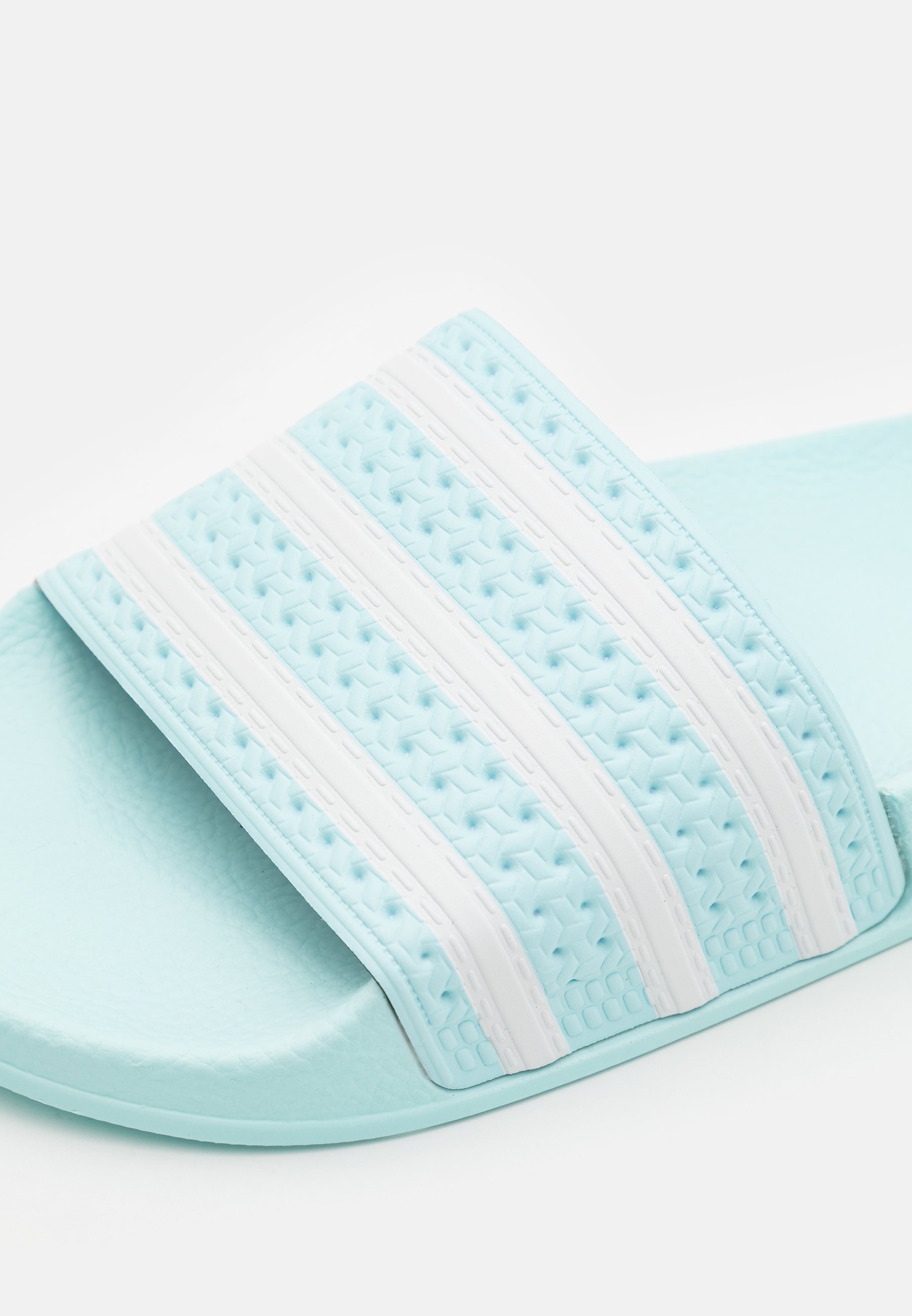 mint green adidas slides