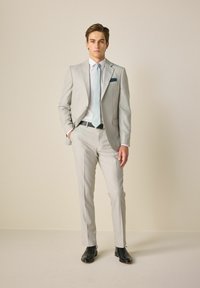 Next Chino hlače - neutral